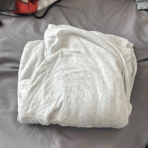 Light fine cardigan. It’s cream colored with gray specs in it.